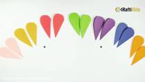ساخت کاردستی یک گل رنگی قلبی شکل با کاغذ رنگی
